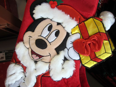 Inside the shops, Mickey appears quite a bit as Santa.