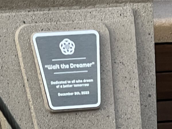 It's a bit fuzzy, but this dedication plaque reads "Walt The Dreamer" and the opening date of December 5, 2024.