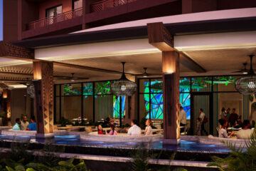 Artist Rendering of the outdoor seating area at Wailulu Bar & Grill. Guests will enjoy spectacular views of Bay Lake and Cinderella Castle at Magic Kingdom Park. © Disney