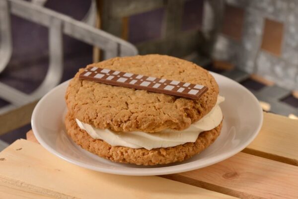 Backlot Express (available on Mobile Order). Wookiee Cookie: Two oatmeal cookies with vanilla cream filling garnished with a milk chocolate sash on top. Photo credits (C) Disney Enterprises, Inc. All Rights Reserved 