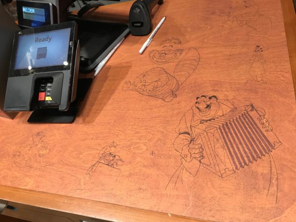 Some animators even drew on their desks, which are now used for the checkout counters!